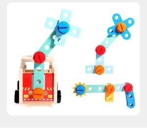 Detail of wooden fire truck toy showing colorful nuts, bolts, and movable crane assembly