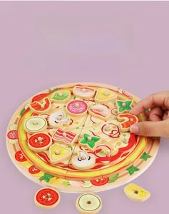 Macro detail of wooden play food pizza with stackable toppings and realistic textures