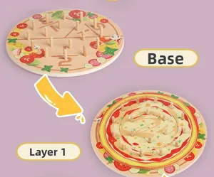Detail of wooden pizza puzzle base showing multiple layers and vegetable illustrations