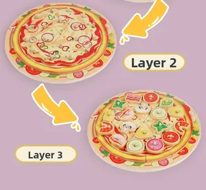 Detail view of multi-layer wooden play pizza toy with various toppings and slice sections