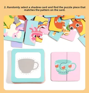 Detail view of colorful cartoon animal puzzle pieces and shadow matching cards for kids