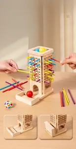Detail of wooden game tower with colorful sticks and foldable ball collection tray