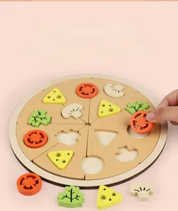 Close-up of wooden pizza puzzle toy showing shape matching and fine motor skill play