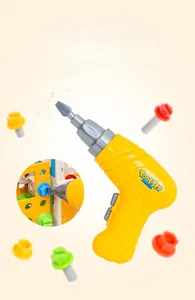 Detail of yellow toy power drill with colorful screws for children's building sets