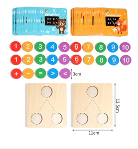 Detail of wooden addition and subtraction learning set with number discs and boards