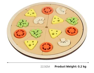 Detail of wooden play pizza toy with colorful vegetable toppings and 22.5cm diameter