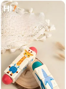 Macro detail of wooden rotating animal puzzle blocks for toddler motor skills training