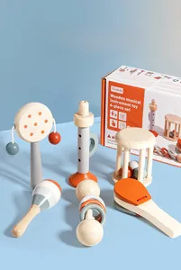 Close-up of wooden musical instrument toy set for infants in macaron colors and gift box