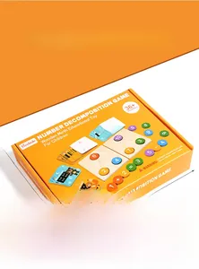 Macro view of wooden math toy packaging showing dimensions 23.5x17x3.5 cm in orange box