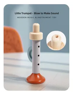 Close-up of a grey and orange wooden trumpet toy for baby musical early education
