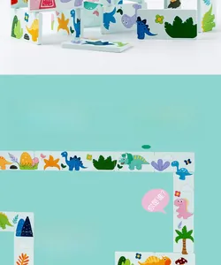 Close-up of wooden dinosaur domino blocks with colorful cartoon patterns for toddlers
