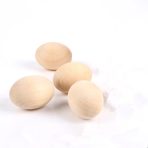 Set of four realistic unpainted wooden eggs for DIY crafts and kids role play