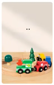Detailed view of colorful wooden toy cars on a natural wood track with trees and signs