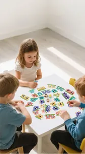 Three kids playing a monster-themed reaction board game with colorful cards and wooden dice