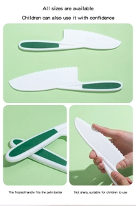 Close-up of safety serrated plastic knife with ergonomic frosted handle for kids