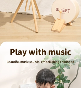 Detail view of wooden foot pedal drum set with natural wood stand for children