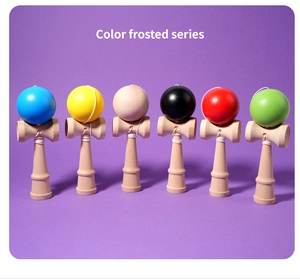 Row of colorful frosted kendama wood toys featuring blue yellow black red and green spheres