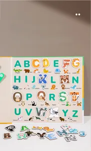 Close-up of magnetic alphabet tiles with colorful animal illustrations for toddler learning