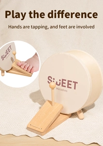 Macro shot of wooden children's drum with foot pedal and sweet melodies logo details