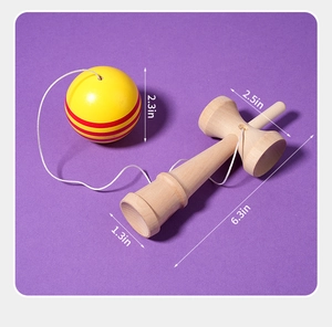 Detailed view of yellow and red wooden Kendama toy with precise dimension measurements