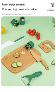 Close-up of wooden kids kitchen toy set with cutting board, knife and peeler