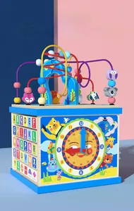 Detail of wooden activity cube with animal bead maze and alphabet learning blocks