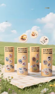 Outdoor close-up of 4 memory matching games for kids with cartoon patterns on grass