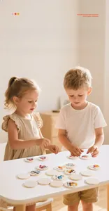 Kids playing with wooden memory match game featuring colorful vehicle patterns
