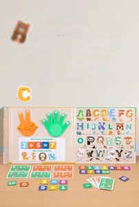Close-up of magnetic alphabet and number tiles with animal illustrations for kids