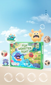 Close-up of Fun Monster Hunt board game box with colorful wooden monster dices for kids