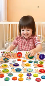 Detail showing toddler matching colorful wooden alphabet blocks on a snail shaped puzzle board