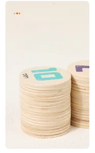 Close-up of stacking wooden educational discs with printed number ten and word ten