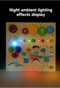 Dettaglio della tavola montessori in legno con luci LED colorate e interruttori nel buio