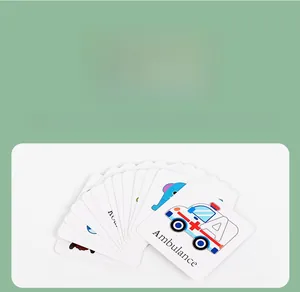 Close-up of double-sided educational cards showing ambulance and letter A for kids