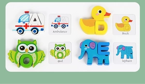 Educational wooden puzzles showing ambulance and animal shapes with alphabet flashcards