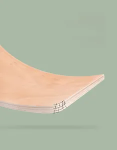 Close-up of smooth rounded edges and natural wood grain on the curved balance board