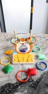 Detailed set of lion-themed children's bean bag toss and ring game with wooden base
