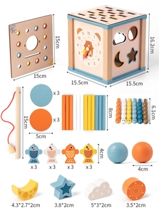 Détail d'une boîte Montessori en bois avec dimensions précises et ses accessoires éducatifs