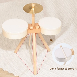 Minimalist wooden drum set for kids with cymbal and storage feature for drumsticks