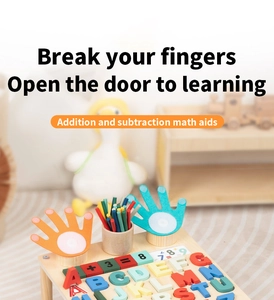 Close-up of wooden alphabet blocks and counting sticks for early math education
