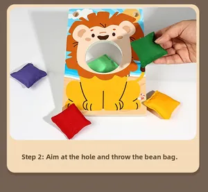Action shot of child throwing a colorful bean bag into the wooden lion board game