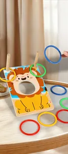 Detail of wooden lion ring toss game with colorful plastic rings for kids coordination