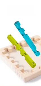Detailed view of natural wooden base with gear-shaped slots and colorful alphabet blocks