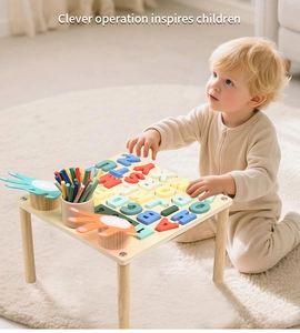 Detail of wooden Montessori activity table with colorful alphabet and number blocks