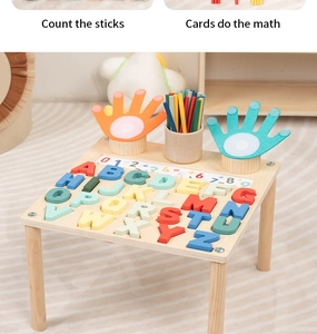 Close-up of wooden alphabet puzzle board with counting sticks for early math learning