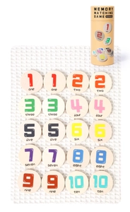 Detailed view of 20 wooden memory match game tiles with numbers 1-10 and storage tube