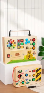 Detail of wooden Montessori busy board with LED light switches and sensory components
