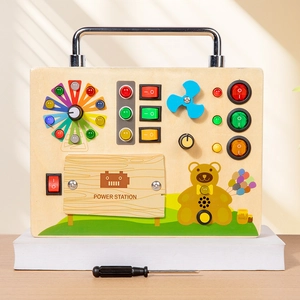 Wooden busy board toy for toddlers with LED lights, colorful buttons, and power station design