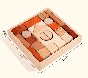 Detailed view of assorted solid wood blocks in various shapes within a wooden tray