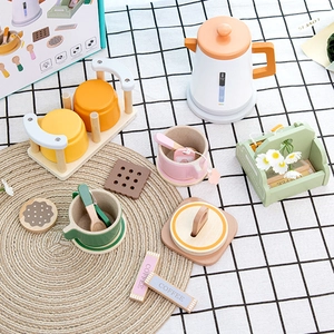 Wooden play coffee and tea set for kids with colorful cups and wooden kettle